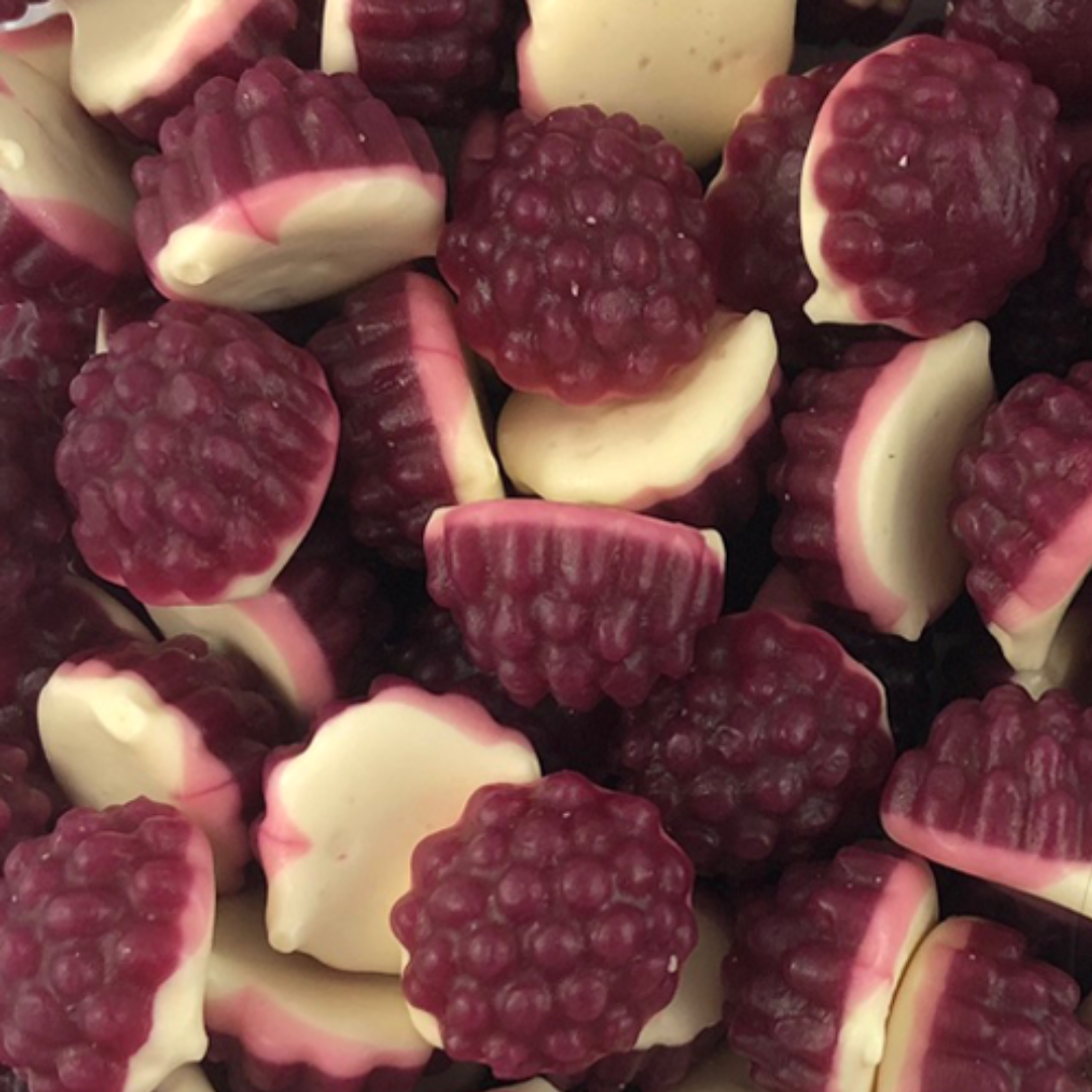 A close-up image of chewy boysenberries-shaped gummy candies with a white and purple color scheme.
