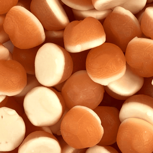 A close-up of peach-flavored gummy candies from Rainbow Confectionery.