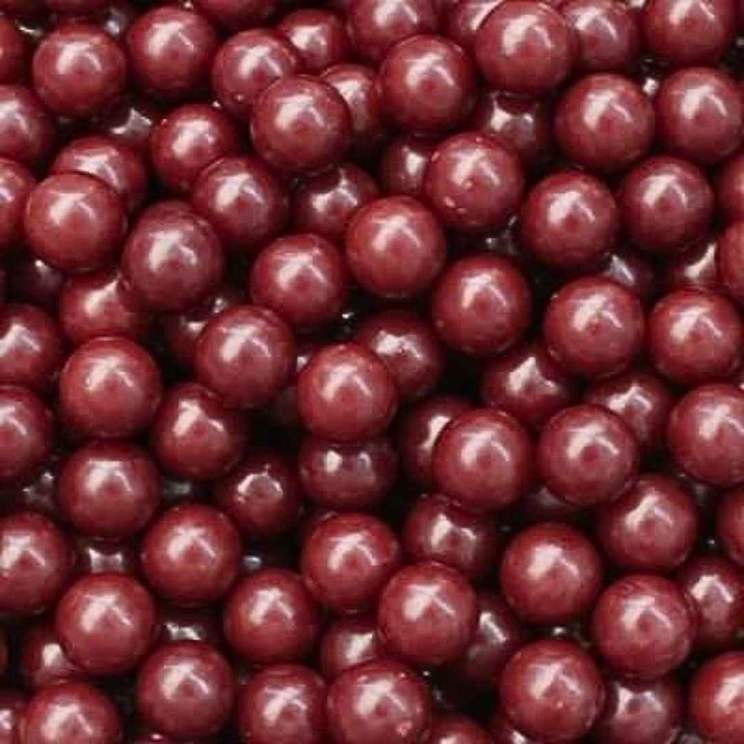 Close-up of dark red candy pearls