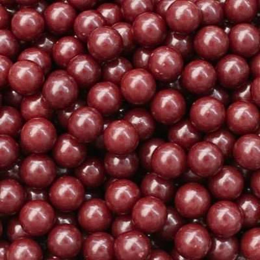 Close-up of dark red candy pearls
