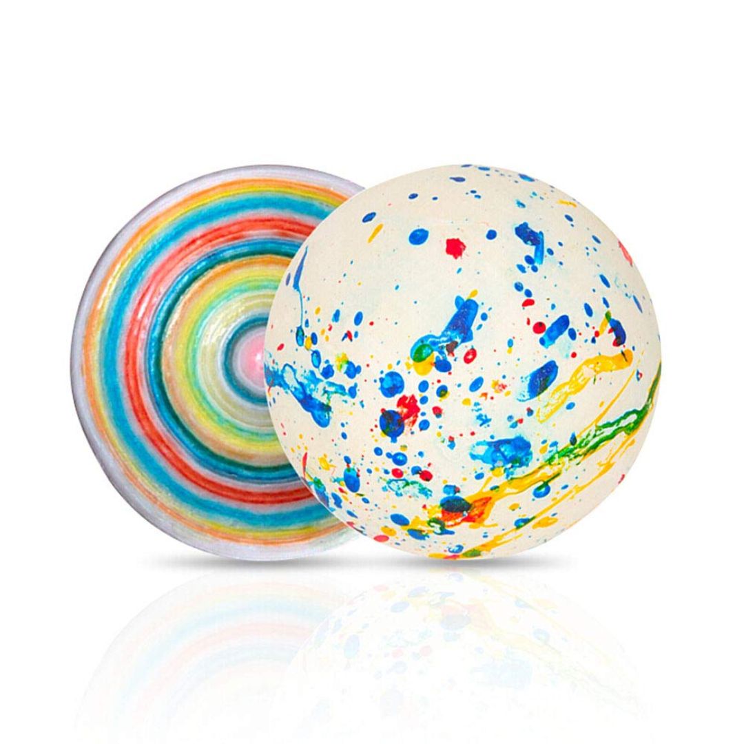 Colorful splatter-patterned ball and rainbow-striped disc on a white background