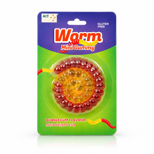 A package of Worm Mini Cummy Bubblegum Flavour candy, featuring a circular, coiled red and yellow gummy worm inside a clear blister pack on a green and purple card backing.