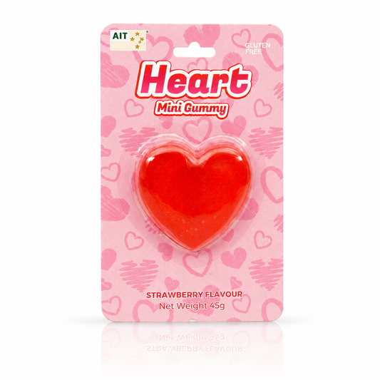 A heart-shaped red strawberry-flavored mini gummy candy in its original pink blister packaging, featuring the brand name 'Heart' and 'AIT' logo.