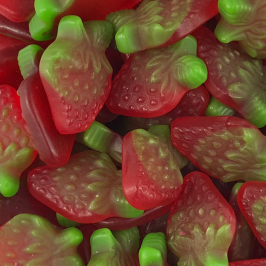 A close-up image of chewy strawberry-shaped hard gummy candies with a burst of sour strawberry flavor, branded by Mayceys of NZ.