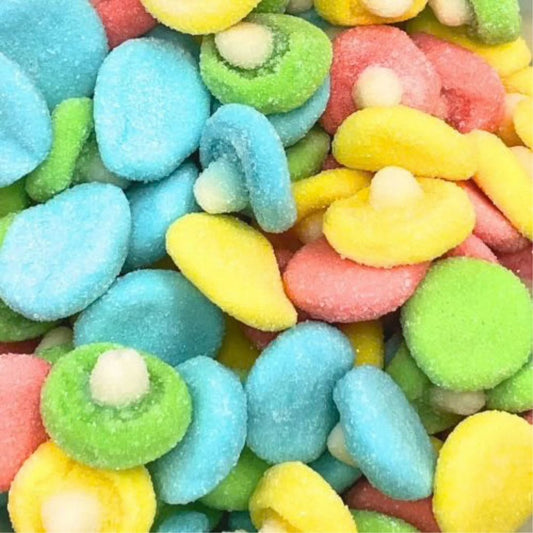 Colorful candy pieces including blue, green, yellow, and pink.